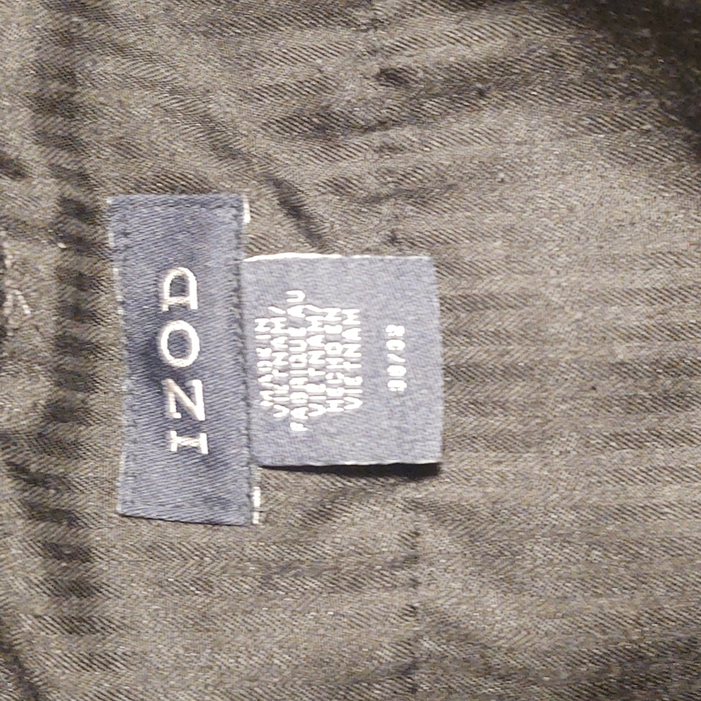 KHAKI. 7 pairs all 36W 30L 6 Black  2 Grey. 1 Tan